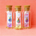 metaphysical gemstone gold necklace in gift bottle